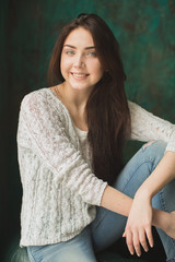 Fototapeta premium Portrait of young lady in photostudio interior
