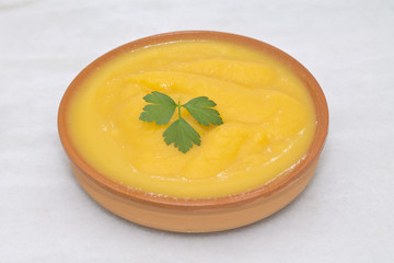 clay plate with soup and vegetable soup