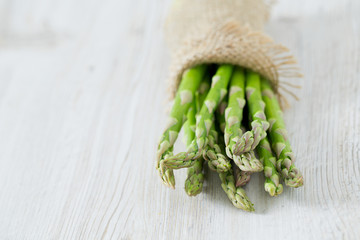 asparagus on wooden surface