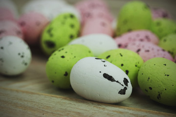 Easter eggs on a wooden background