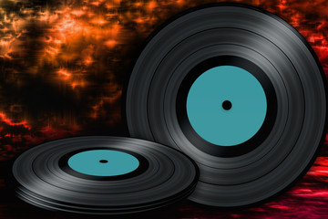 vinyl records closeup on an orange background