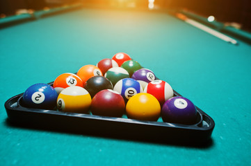 Billiard balls in a pool table at triangle