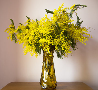 flowers in a vase on the table. spring day.