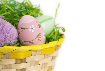 Isolated Easter eggs in a basket