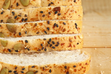 Whole wheat bread on wooden background.copy space