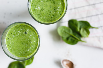 Two green smoothie in the glass