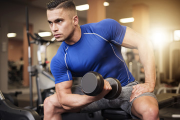 Man focused on shoulder workout