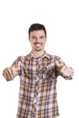 Happy young man with thumbs up on white background