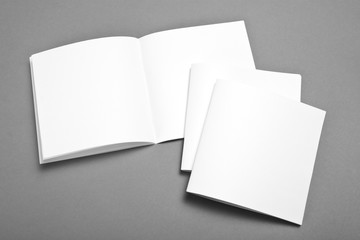 Blank opened magazine isolated on grey background with soft shadow