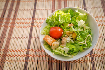 Caesar salad made of fresh vegetables. Selective focus.