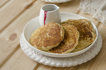 Pancake with jam from the black currant for a breakfast   