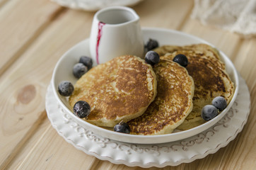Pancake with jam from the black currant for a breakfast   