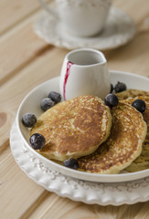 Pancake with jam from the black currant for a breakfast   