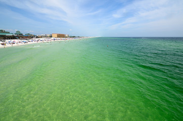 Paradise beach with clear water and people
