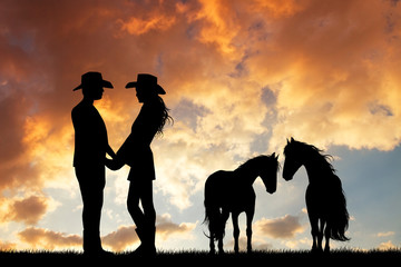 couple of cowboys with horse at sunset © adrenalinapura