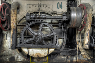 Fototapeta na wymiar Gear wheels in colonial sugar factory in Gondang Baru, Java, Indonesia