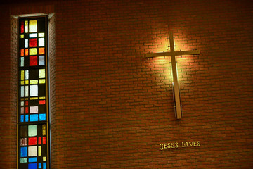 Inside the church with a cross and Jeasus Lives