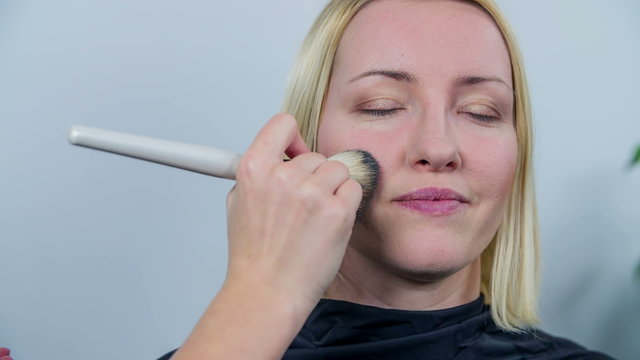Make up done by professional with brash 