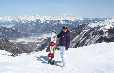 Naklejka na ściany i meble Young woman on the Kaprun, skiing resort in Austria.