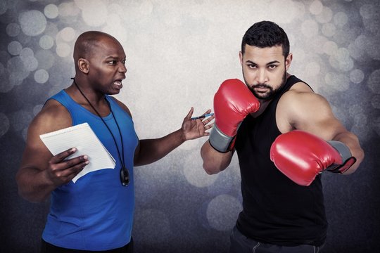 Composite Image Of Boxing Coach With His Fighter