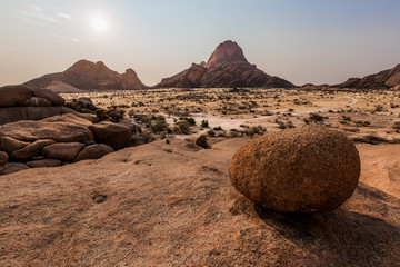 A typical stone dominates the Namibian savanna