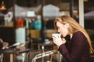 Woman drinking a cup of coffee