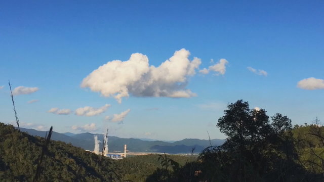 Aerial view Coal power plant of LAOS with smoke goes from tubes of power plant in cold day at winter
