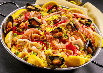 Gourmet seafood paella with prawns and mussels