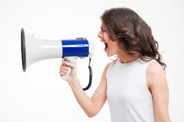 Fototapeta premium Woman screaming into megaphone