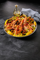 Gourmet seafood paella with langoustines