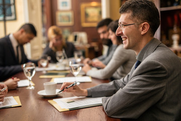 Group of successful businessmen people in a meeting in office
