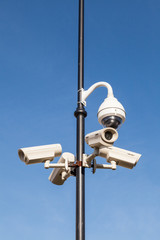 Fototapeta na wymiar Security cctv cameras on pylon
