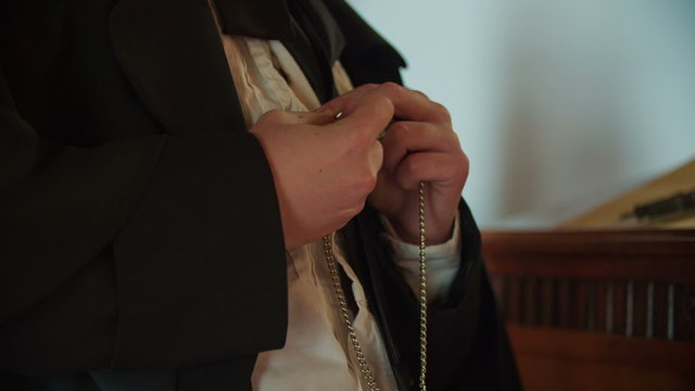 Watch on the chain is taking off by man in the Middle ages