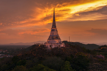 Beautiful big pagoda with Phra Nakhon Khiri on sunset time at Phetchaburi Province, Thailand