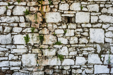 Old dirty stone white wall background in rural Ireland