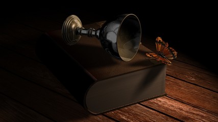 Old book with Butterfly and wine goblet on wooden table