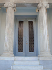Obraz premium House entrance with solid wood door, Athens Greece