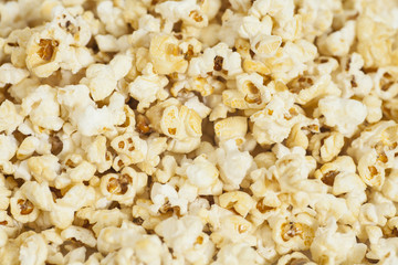 Salted popcorn grains texture background