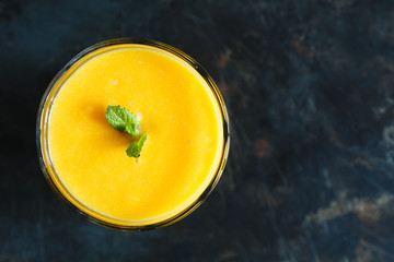 orange smoothie in the glass