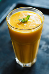 orange smoothie in the glass