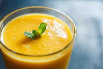 orange smoothie in the glass