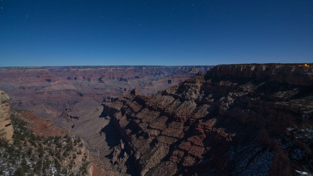 A night time-lapse overlooking the Grand Canyon with moon shadows
