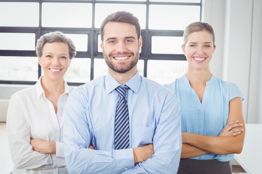 Cheerful Business People With Arms Crossed