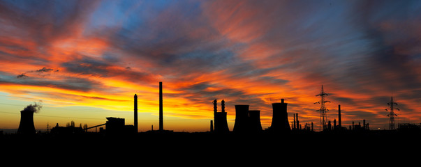 Naklejka na ściany i meble industrial silhouette at sunset