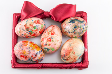 painted easter eggs in a frame