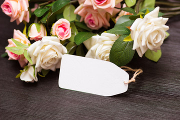 Mothers day empty card with rustic roses on wooden board