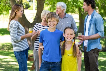 Smiling family standing
