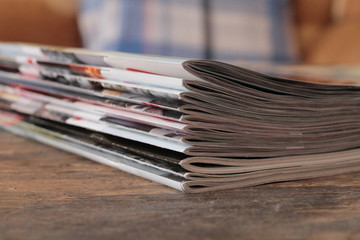 Magazines on the wooden table