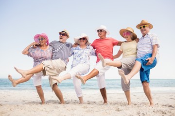 Happy senior friends dancing 