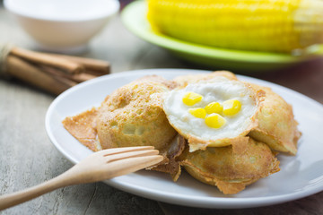 Kanom Krok on wooden table. Kind of Thai sweetmeat , thai desser